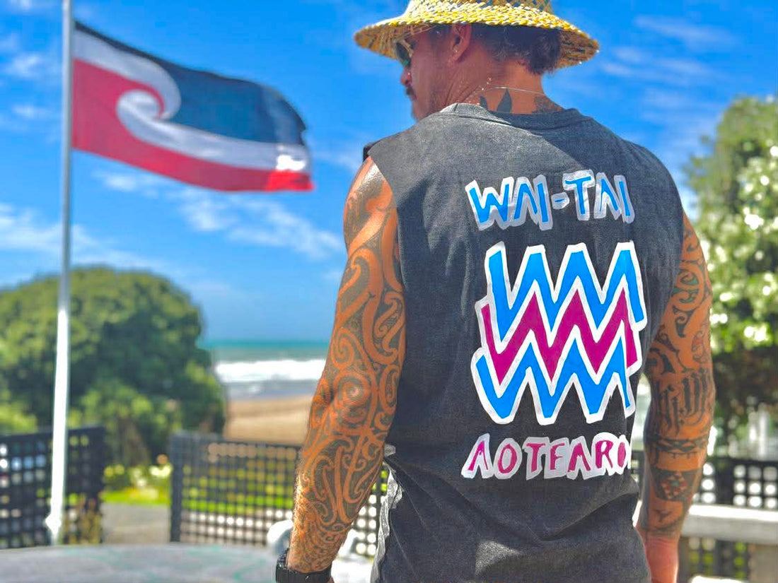 Maia Gibbs in a Māori singlet featuring indigenous artwork by Wai-Tai Aotearoa